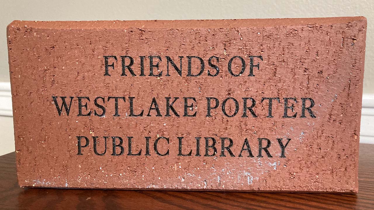 sample laser-engraved brick reads Friends of Westlake Porter Public Library